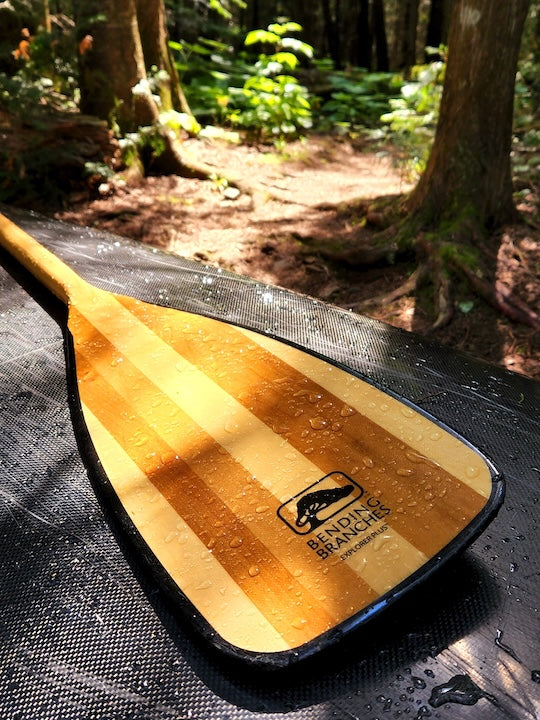 Bending Branches canoe paddle with Rockgard edge protections, water droplets on the blade